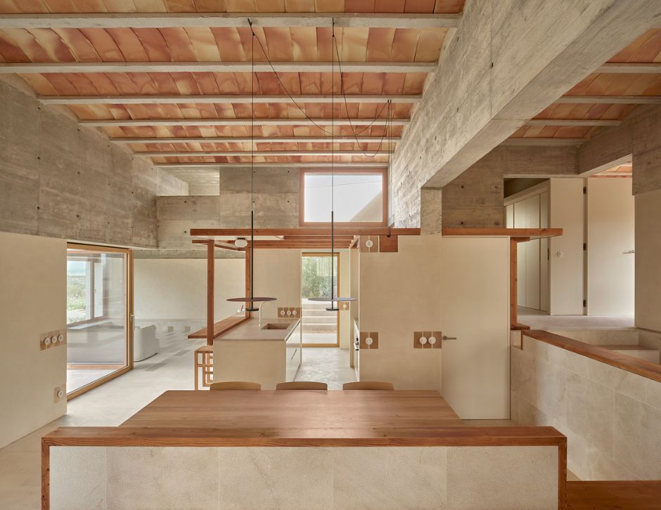 House in Puntiró: An Exceptional Multi-Family Home Design